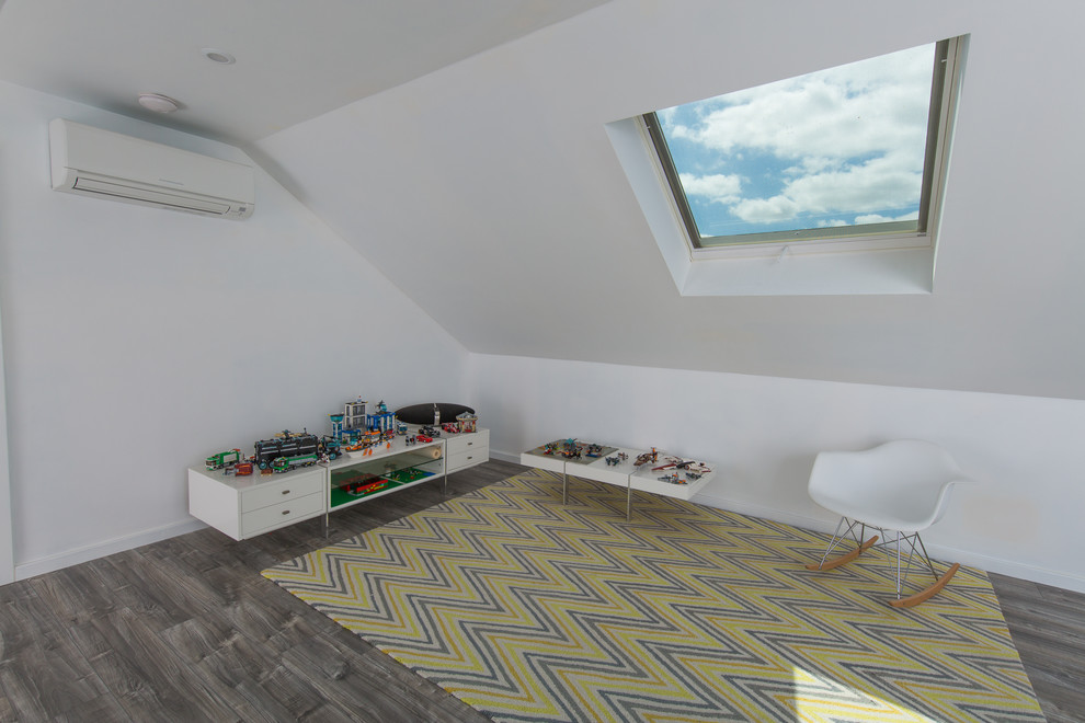 Inspiration for a mid-sized contemporary gender-neutral kids' room in Perth with white walls and vinyl floors.