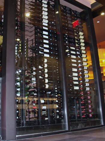 Design ideas for a small contemporary wine cellar in Orange County with storage racks.