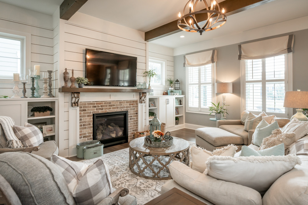 Example of a cottage living room design in Louisville