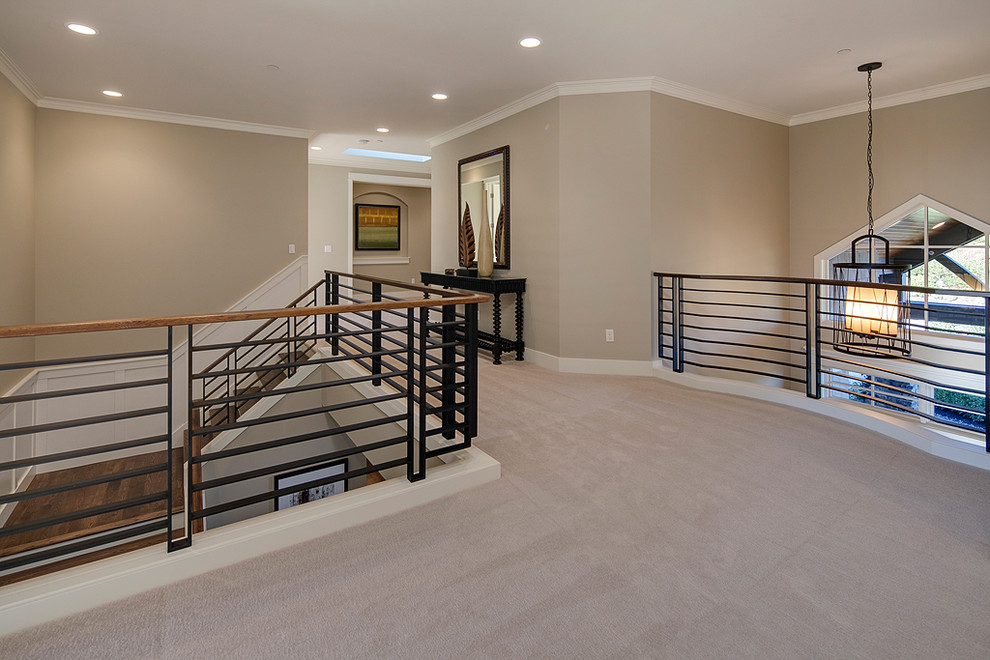Contemporary hallway in Seattle with beige walls and carpet.