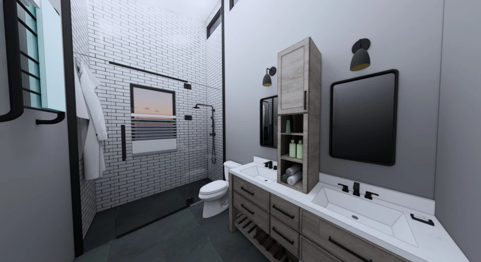 На фото: главная ванная комната среднего размера с плоскими фасадами, светлыми деревянными фасадами, душем без бортиков, унитазом-моноблоком, желтой плиткой, керамической плиткой, серыми стенами, полом из сланца, монолитной раковиной, столешницей из кварцита, черным полом, душем с распашными дверями, белой столешницей, нишей, тумбой под две раковины, напольной тумбой и сводчатым потолком с