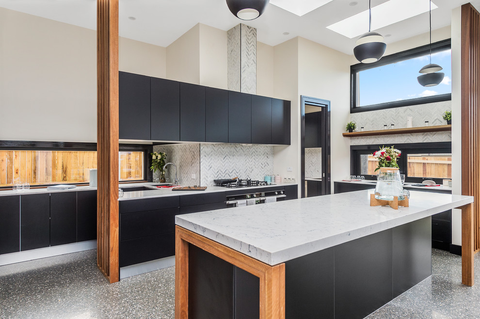 Contemporary kitchen in Canberra - Queanbeyan with an undermount sink, flat-panel cabinets, black cabinets, window splashback, black appliances, with island and black floor.
