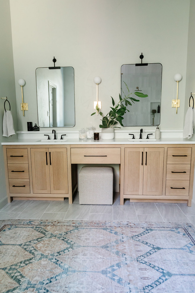 This is an example of a mid-sized modern master bathroom in Dallas with furniture-like cabinets, light wood cabinets, a freestanding tub, a double shower, a one-piece toilet, green tile, subway tile, green walls, ceramic floors, an undermount sink, quartzite benchtops, multi-coloured floor, a hinged shower door, white benchtops, a niche and a built-in vanity.