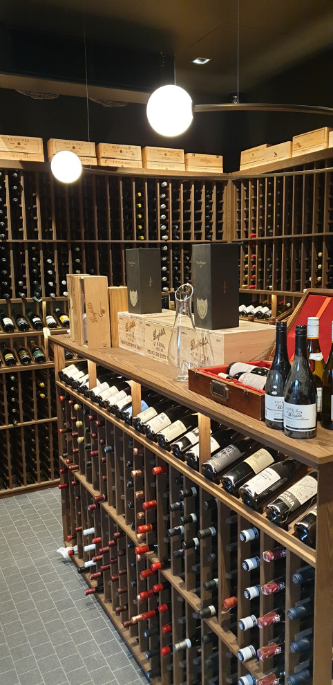 Photo of a contemporary wine cellar in Melbourne.