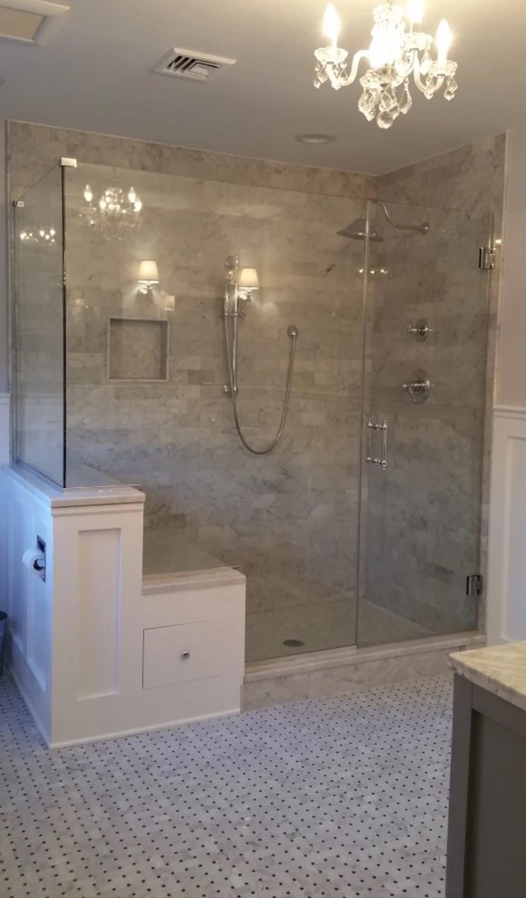 Mid-sized traditional master bathroom in Newark with an alcove shower, a one-piece toilet, beige tile, brown tile, stone tile, beige walls and mosaic tile floors.