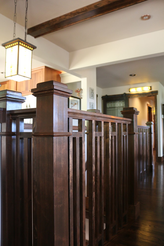 Inspiration for an arts and crafts wood l-shaped staircase in Denver with wood risers and wood railing.