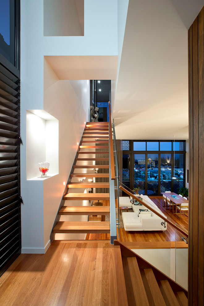 Contemporary wood l-shaped staircase in Gold Coast - Tweed with open risers.