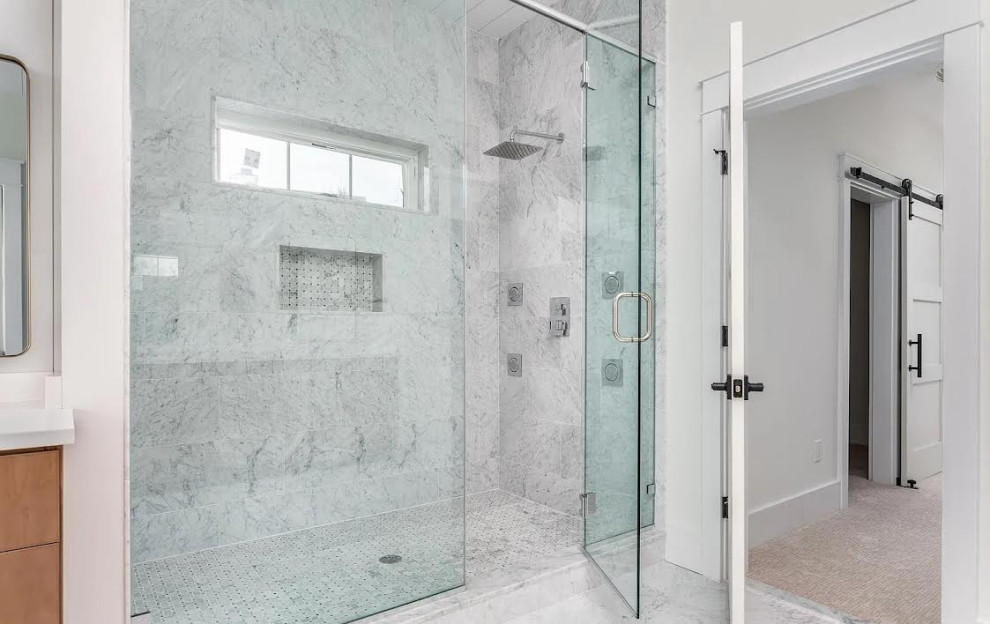 Inspiration for a medium sized modern ensuite bathroom in Bridgeport with flat-panel cabinets, medium wood cabinets, a freestanding bath, an alcove shower, a one-piece toilet, white walls, limestone flooring, a submerged sink, engineered stone worktops, white floors, a hinged door, white worktops, double sinks and a built in vanity unit.