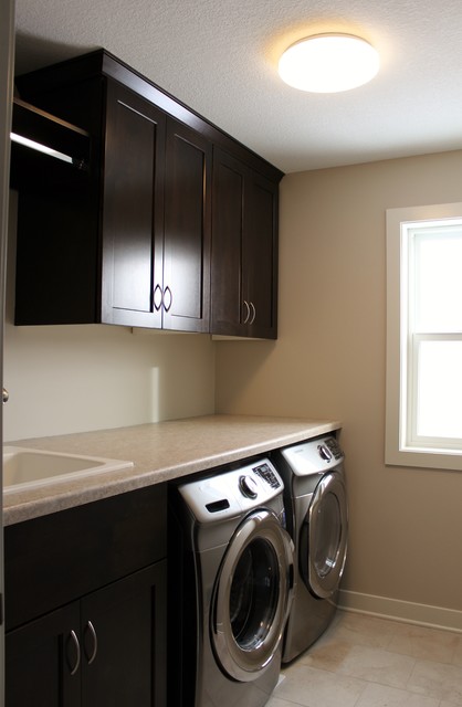 Berg Residence transitional-laundry-room