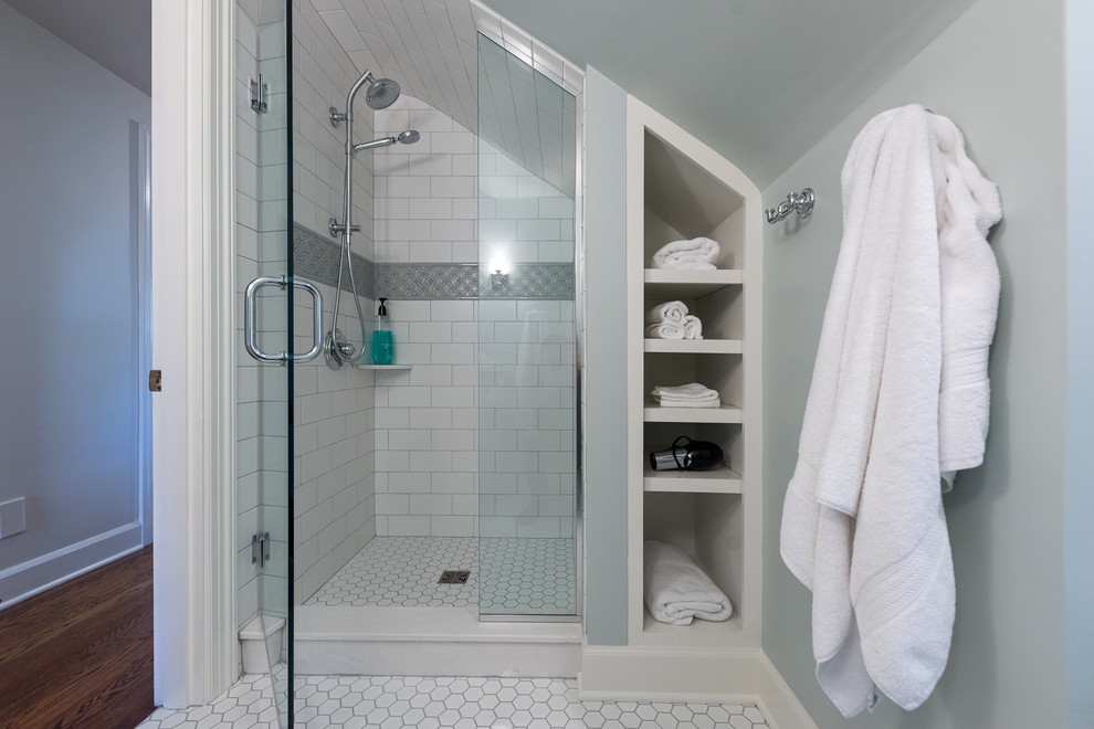 Inspiration for a small traditional 3/4 bathroom in Other with flat-panel cabinets, white cabinets, white tile, ceramic tile, blue walls, ceramic floors, an undermount sink, granite benchtops, white floor, a hinged shower door, an alcove shower and grey benchtops.