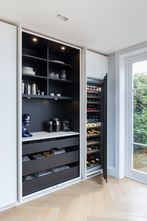 Bold and Beautiful: Black and White Modern Kitchen Design with Wood Flooring and Coffee Bar Ideas