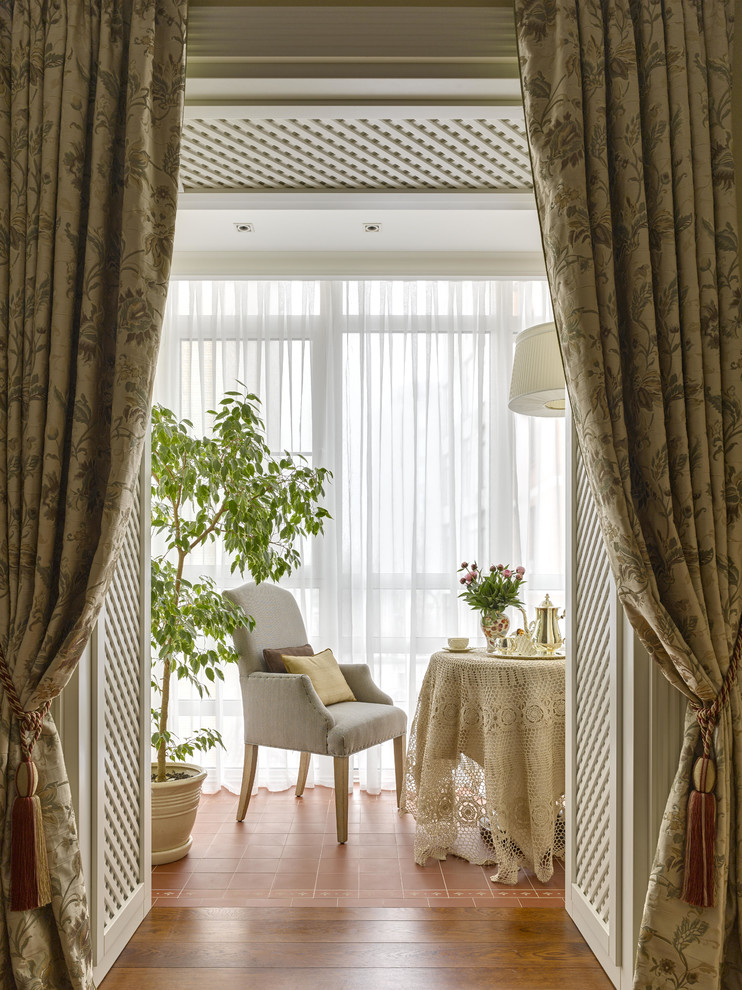 This is an example of a small traditional sunroom in Moscow.