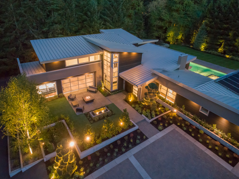 Mid-sized contemporary home design in Portland.