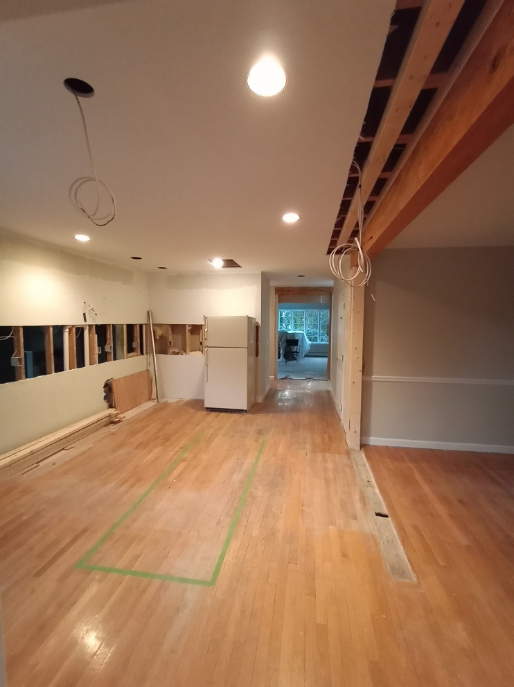 Installed header at end of hallway and new beam in the dining room