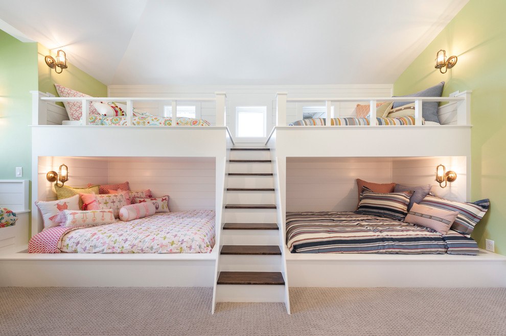 Photo of a transitional gender-neutral kids' bedroom in Salt Lake City with green walls and carpet.