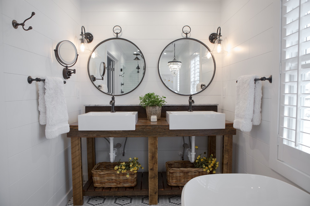 Design ideas for a small country master bathroom in Kansas City with open cabinets, a freestanding tub, a corner shower, white tile, white walls, marble floors, a vessel sink and mosaic tile.