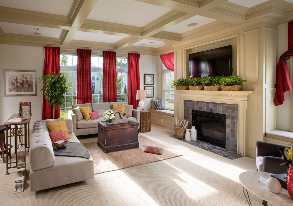Photo of a mid-sized traditional open concept family room in Columbus with white walls, carpet, a standard fireplace, a tile fireplace surround and a wall-mounted tv.