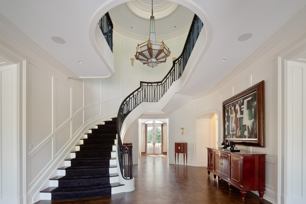 This is an example of a traditional wood curved staircase in New York.