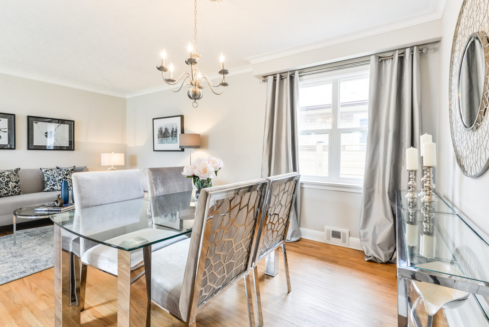 Transitional dining room photo in Toronto