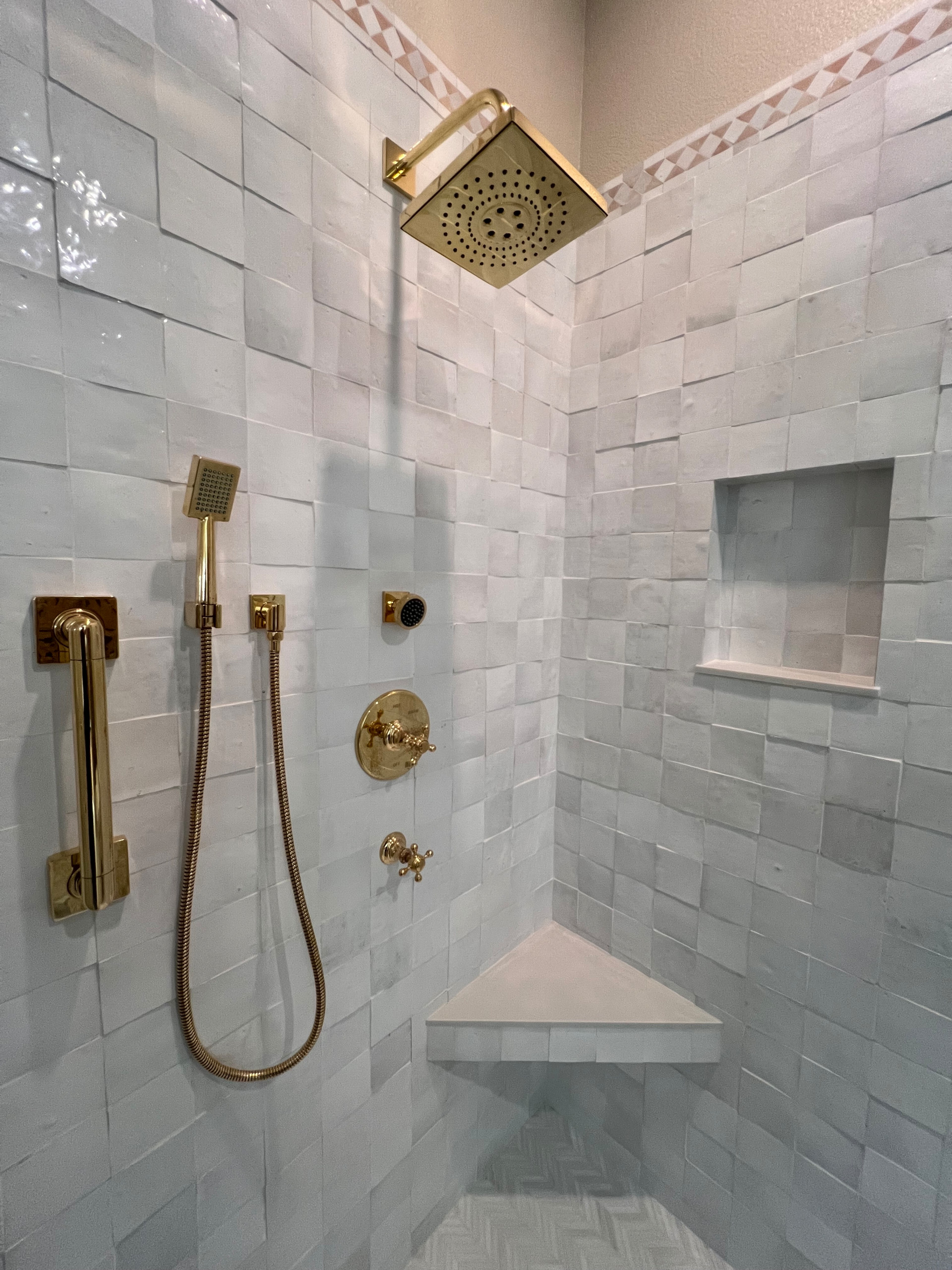 Zellige Tile Amplifies the Warm Luster of the Old-World Style Brass Fixtures