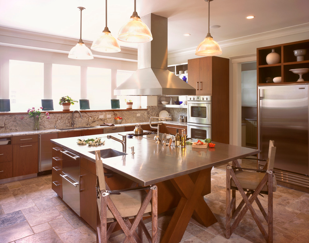 Photo of a large contemporary u-shaped eat-in kitchen in Nashville with an integrated sink, flat-panel cabinets, medium wood cabinets, stainless steel benchtops, multi-coloured splashback, stone slab splashback, stainless steel appliances and with island.