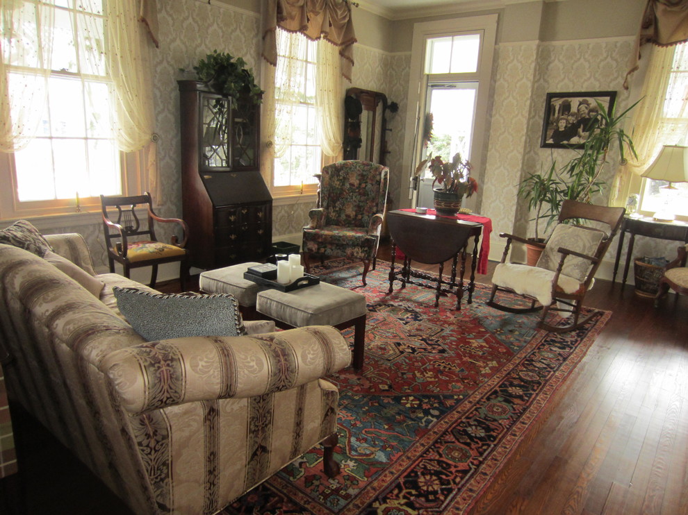 Mid-sized country enclosed living room in Philadelphia with medium hardwood floors.