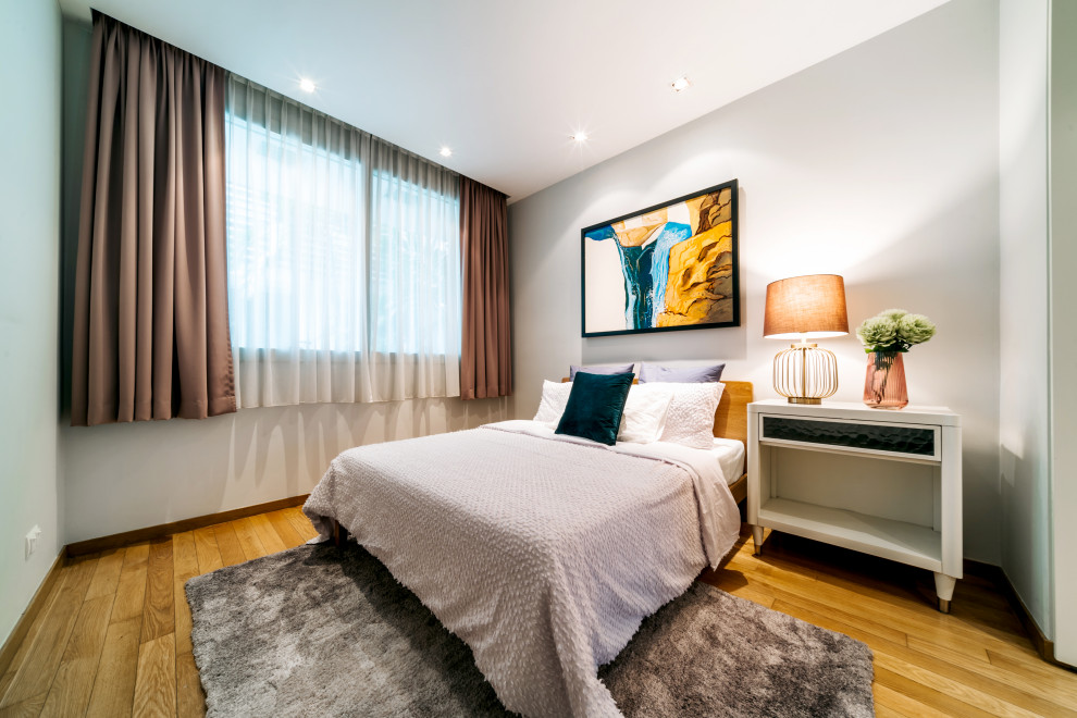 Inspiration for a contemporary bedroom in Singapore.