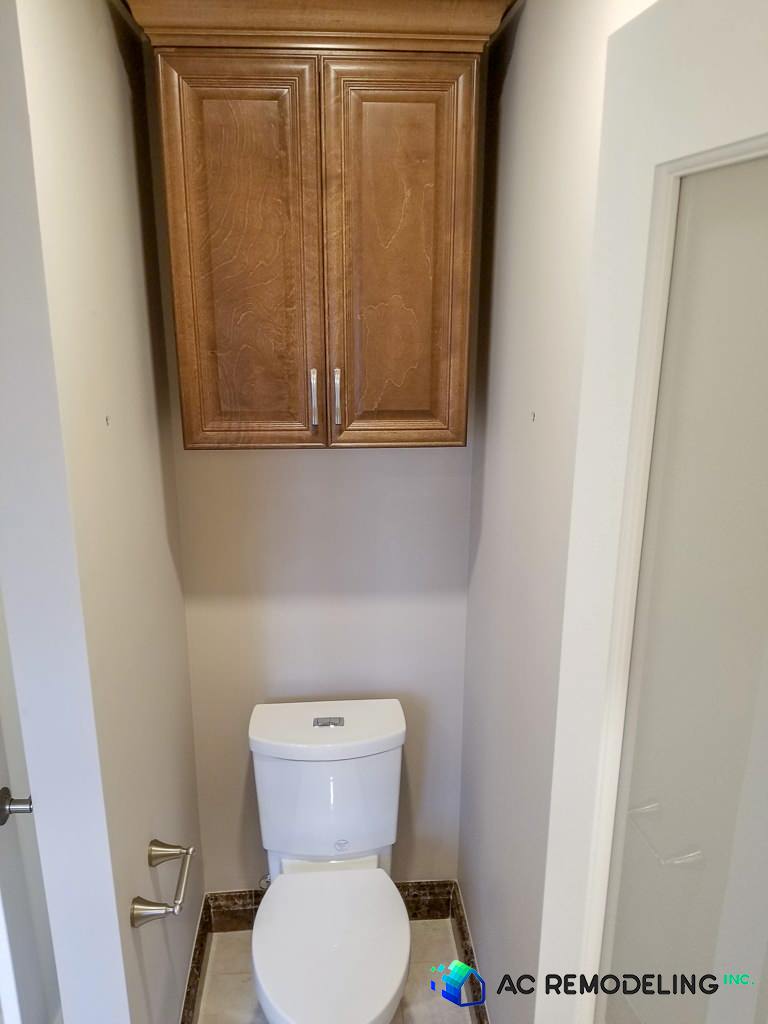 Elongated toilet with dual flash.
