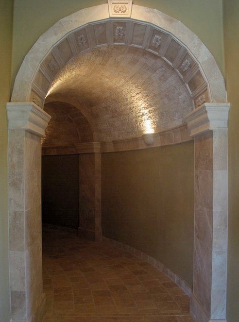 Mid-sized traditional hallway in Phoenix with limestone floors.