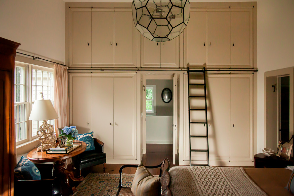 Inspiration for a transitional dark wood floor bedroom remodel in Dallas with white walls and no fireplace
