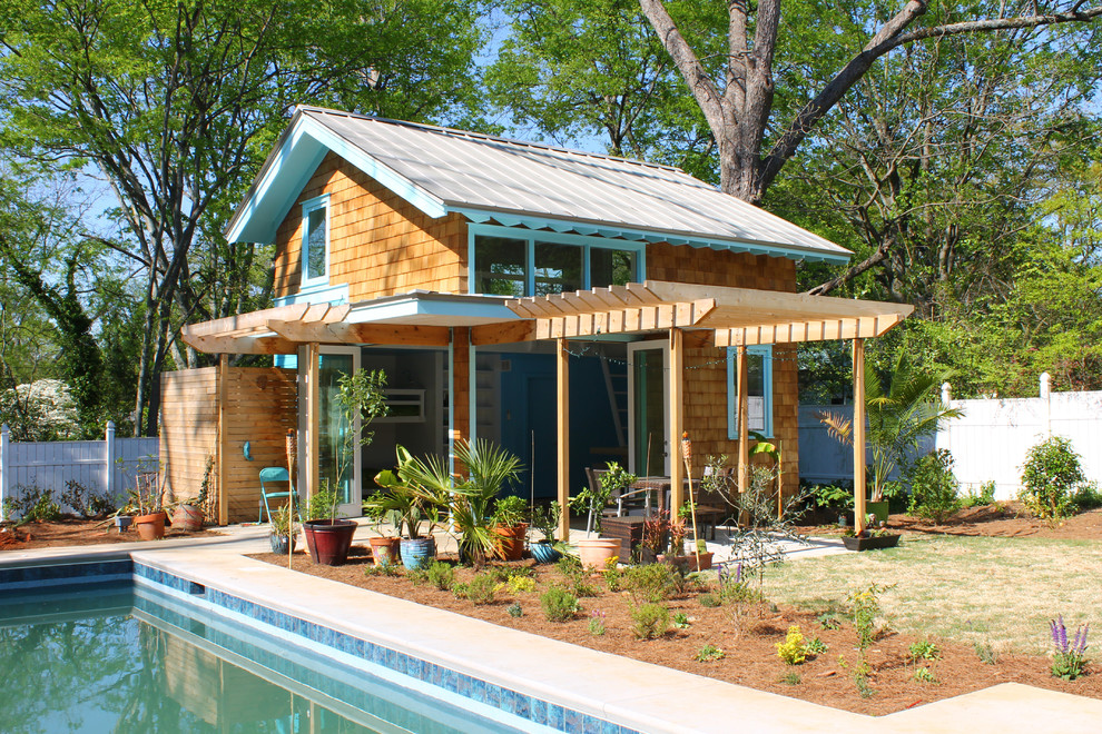 Photo of a mid-sized beach style detached granny flat in Atlanta.