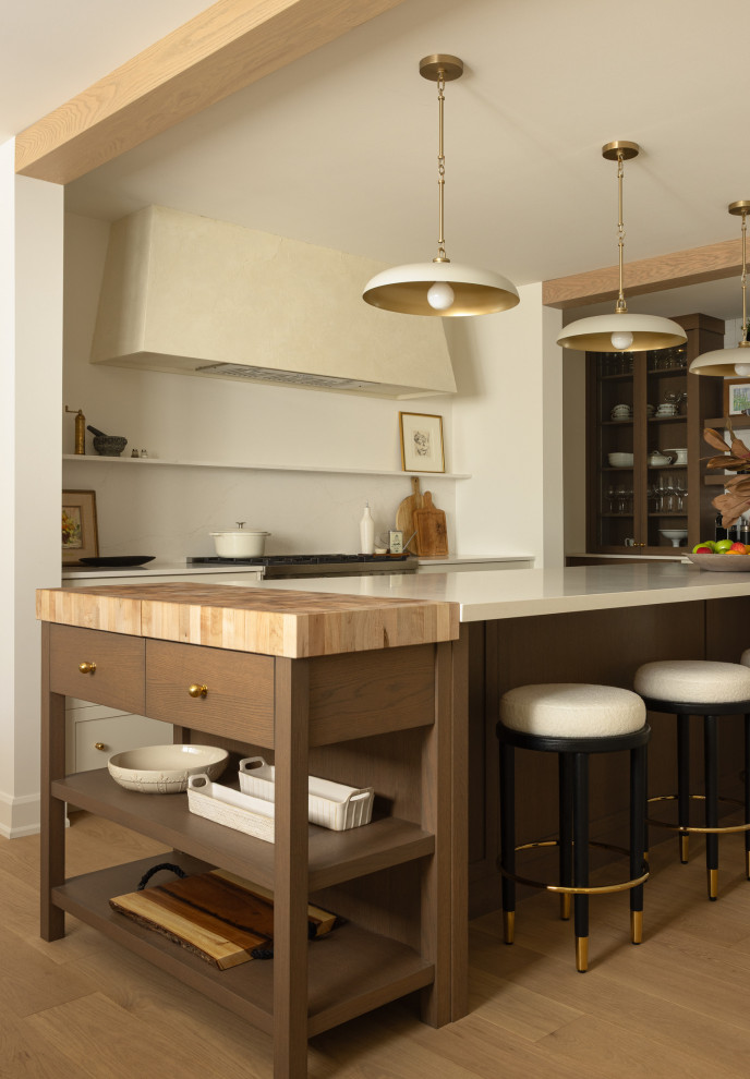 Example of a transitional kitchen design in Toronto