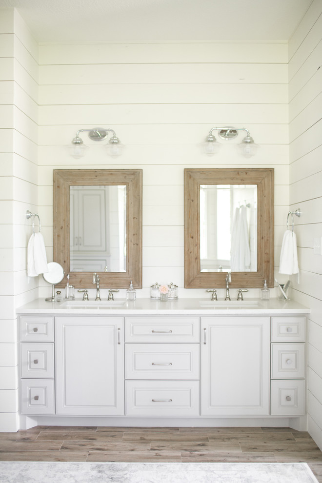 Inspiration for a large country master bathroom in Houston with a freestanding tub.