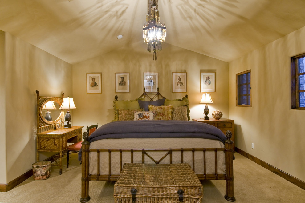 Photo of a traditional bedroom in Phoenix with beige walls and carpet.