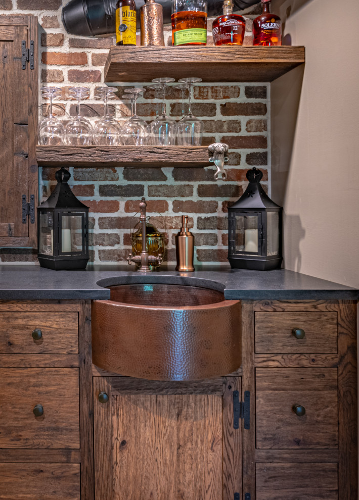 Design ideas for a small country u-shaped wet bar in Philadelphia with shaker cabinets, medium wood cabinets, concrete benchtops, brown splashback, brick splashback, porcelain floors and grey benchtop.