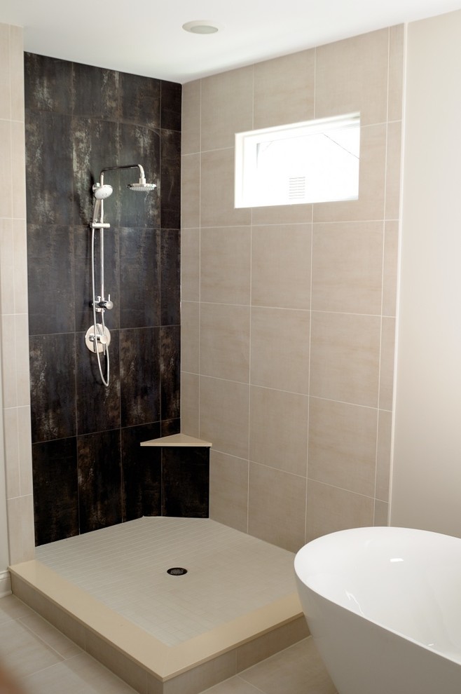 Inspiration for a mid-sized contemporary master bathroom in Chicago with glass-front cabinets, beige cabinets, a freestanding tub, an alcove shower, a one-piece toilet, beige tile, ceramic tile, beige walls, ceramic floors, a drop-in sink and quartzite benchtops.