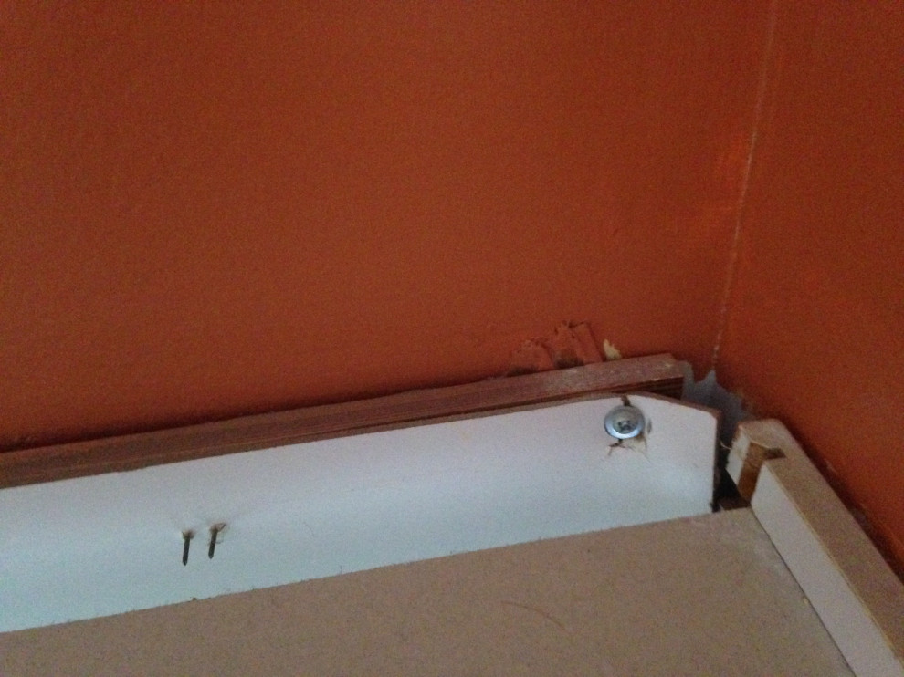 Upper kitchen pulling away from wall