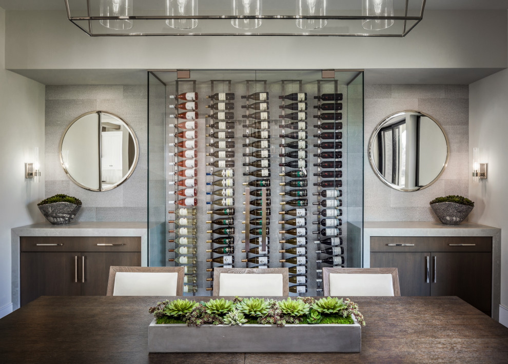 Mid-sized contemporary wine cellar in Los Angeles with display racks.