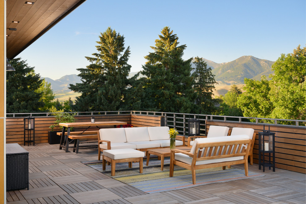 Inspiration for an industrial rooftop and rooftop deck in Other with an outdoor kitchen, no cover and mixed railing.