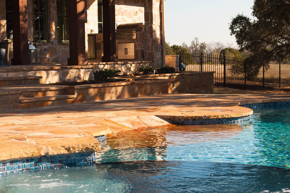 Example of a mountain style home design design in Austin