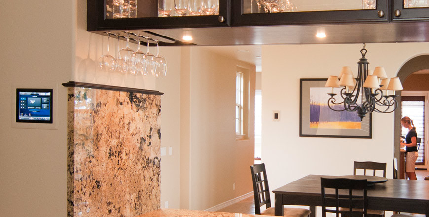 Large transitional medium tone wood floor and brown floor enclosed dining room photo with beige walls