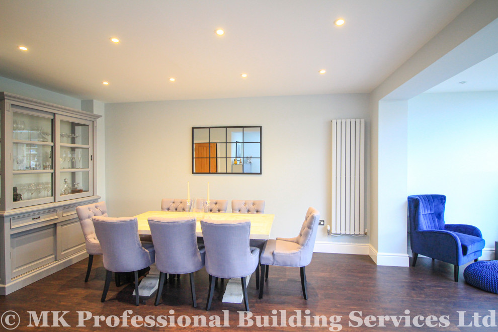 Design ideas for a modern dining room in Surrey.