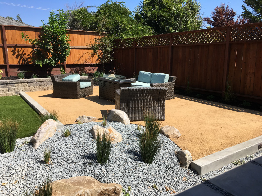Mid-sized contemporary backyard patio in San Francisco with a fire feature, decomposed granite and no cover.