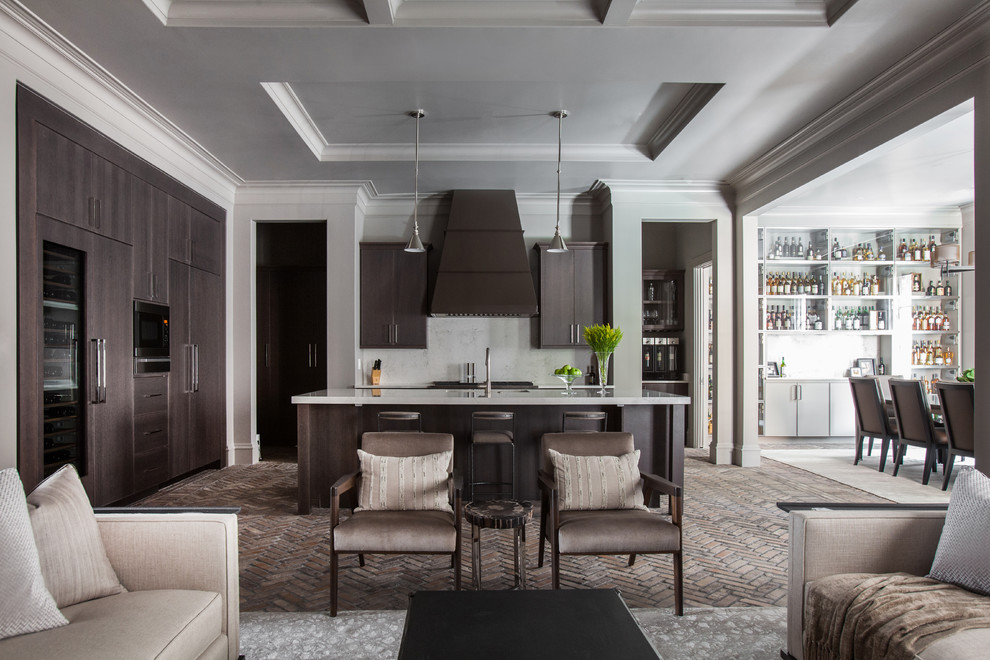 This is an example of a transitional l-shaped open plan kitchen in Houston with flat-panel cabinets, dark wood cabinets, white splashback, brick floors and with island.