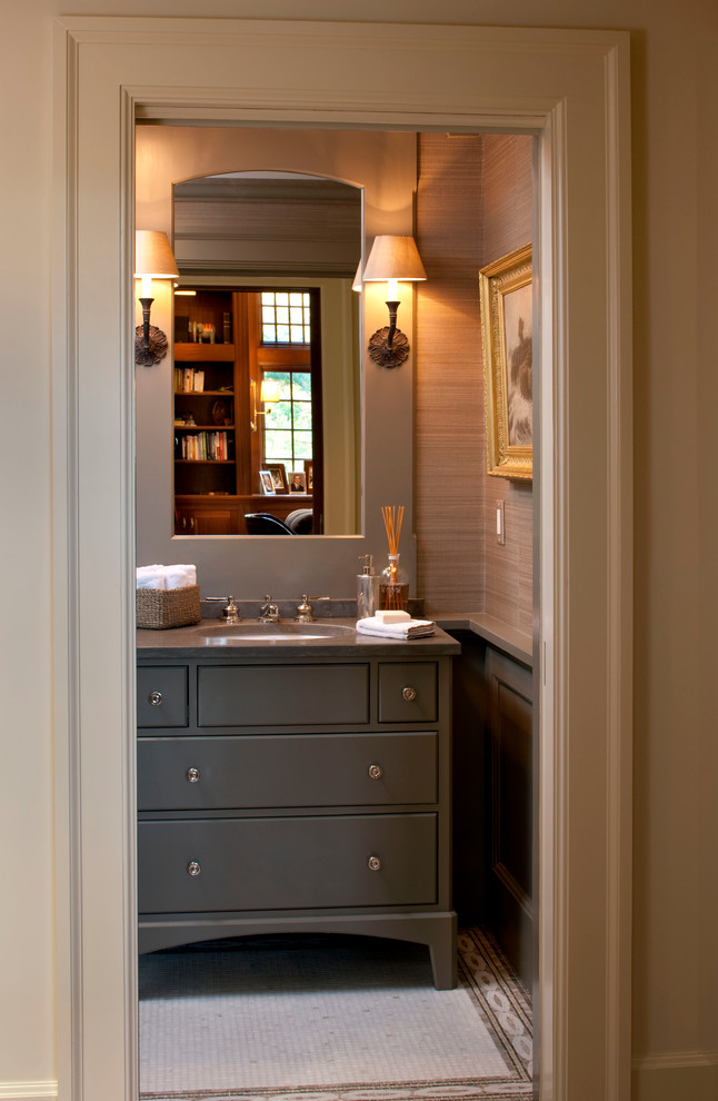 Traditional bathroom in Boston with an undermount sink, mosaic tile floors and brown benchtops.