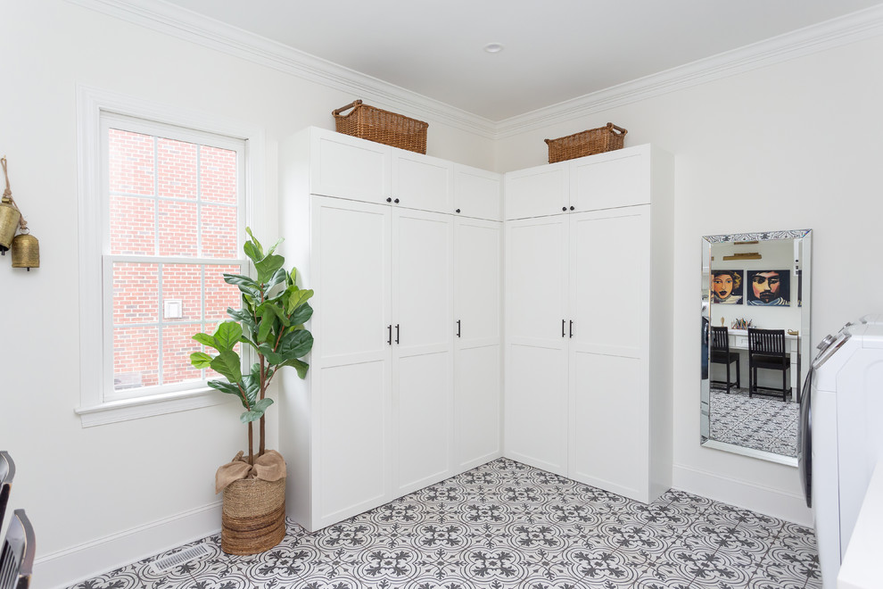 This is an example of an eclectic laundry room in Raleigh.