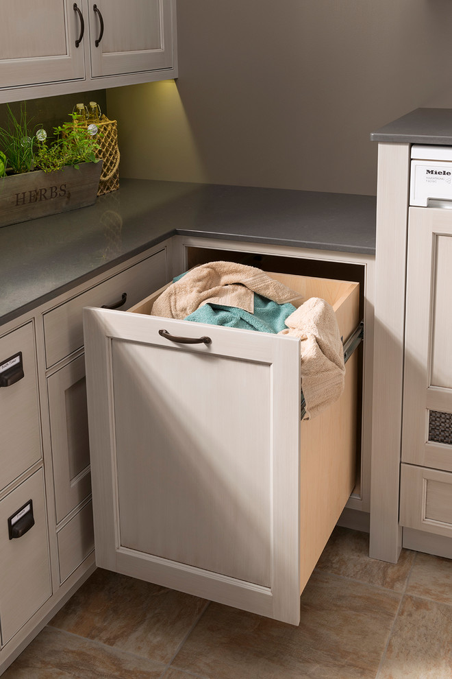 Inspiration for a transitional laundry room in Other with shaker cabinets and beige cabinets.