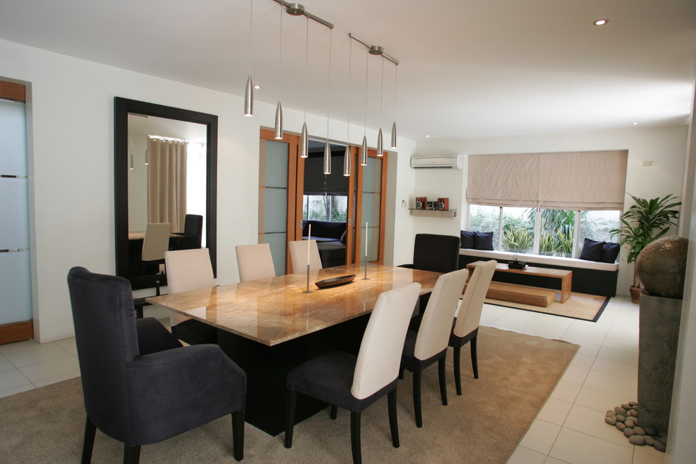 Design ideas for a contemporary open plan dining in Other.