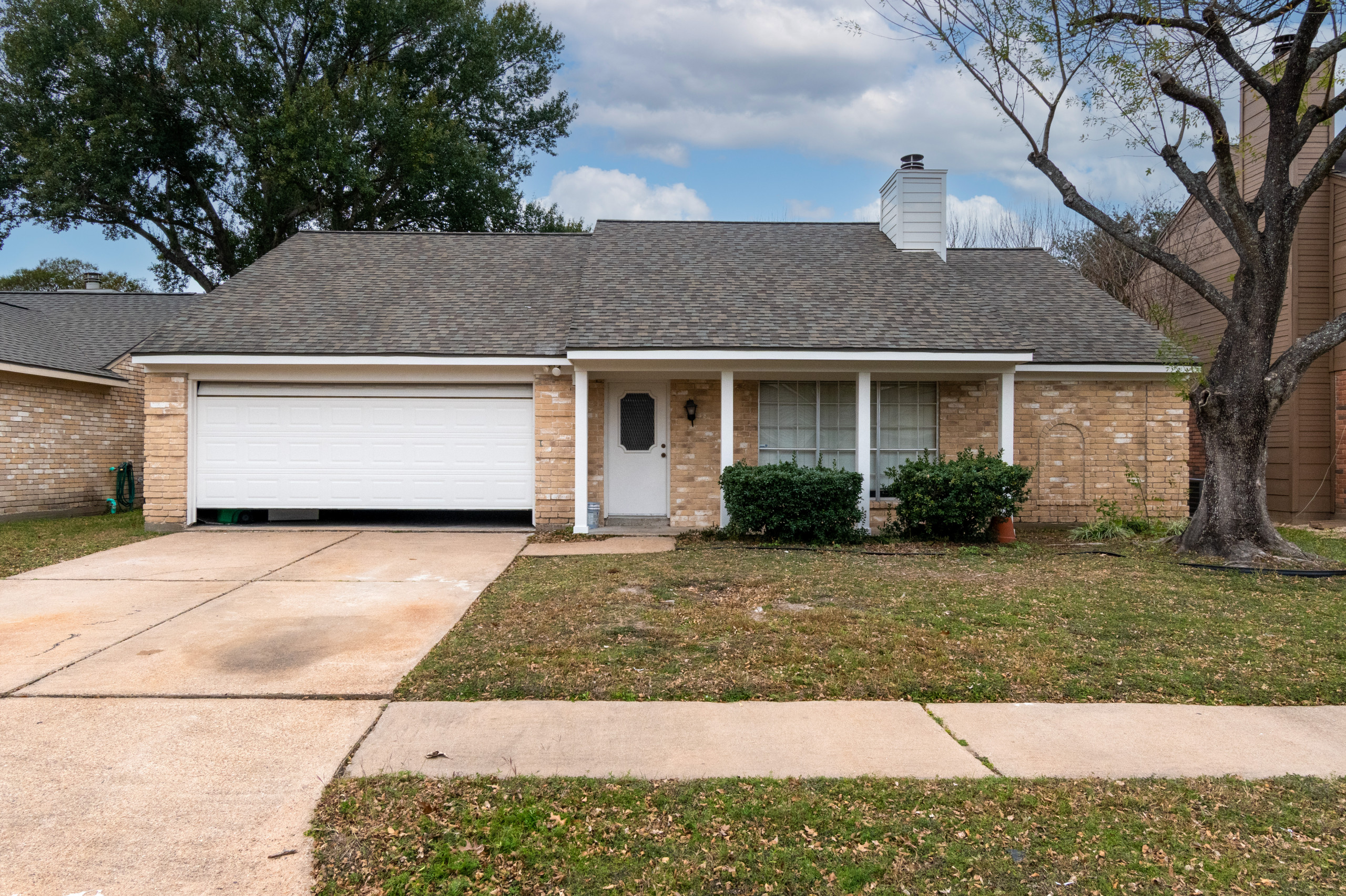 Brick Home Refresh with Hardie Siding, Fascia, Soffit, and Modern Column Replace
