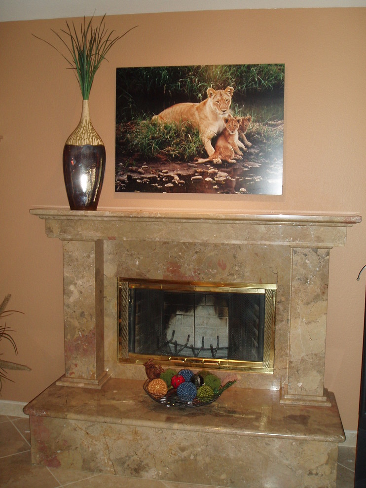 Photo of a mid-sized eclectic family room in Phoenix with a stone fireplace surround.